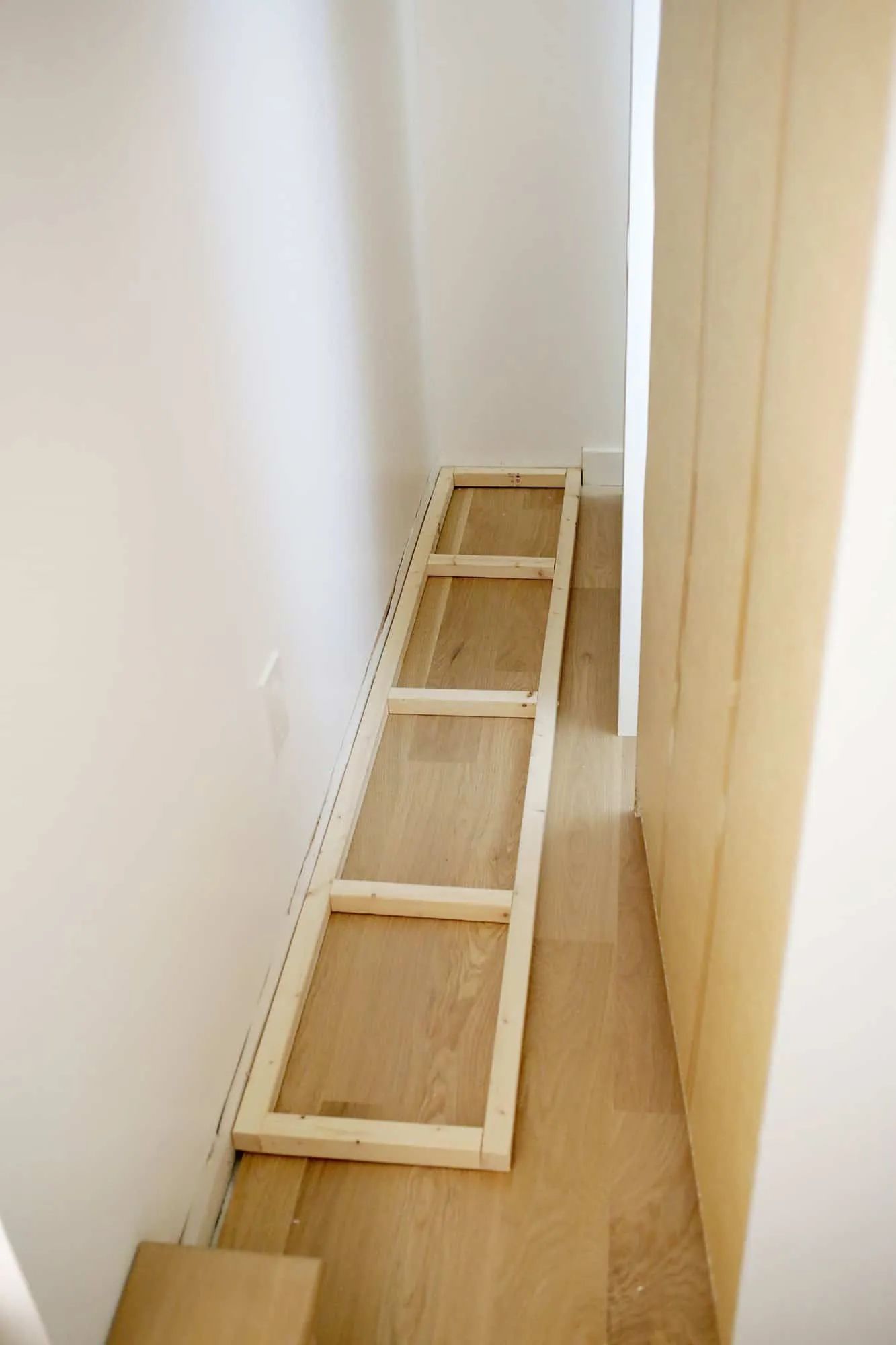 platform for wardrobe sitting on floor