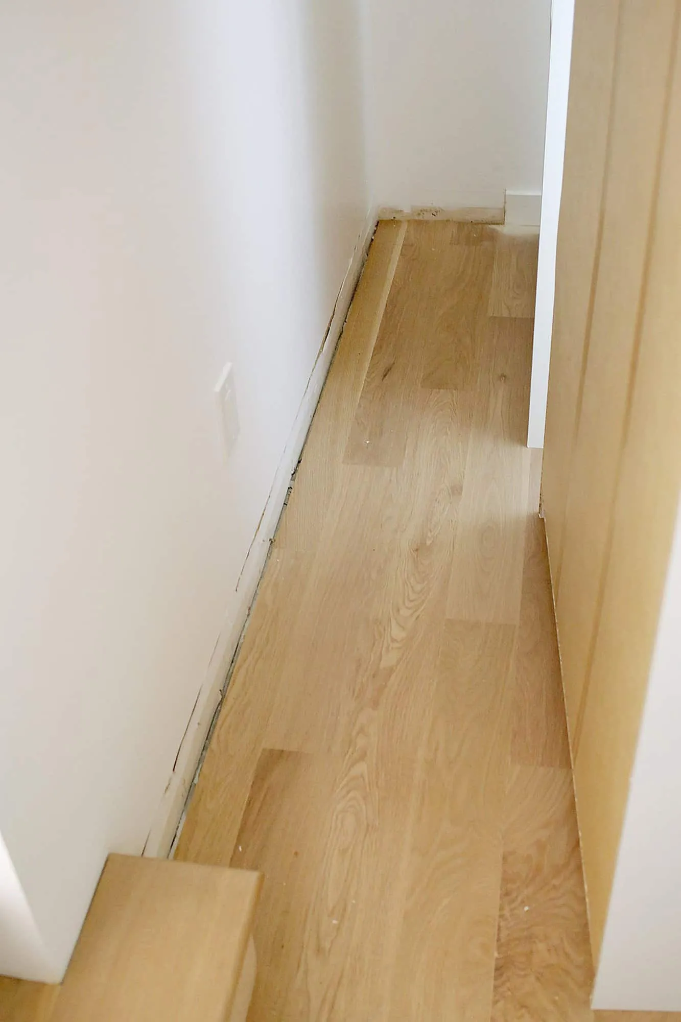 baseboard removed from wall