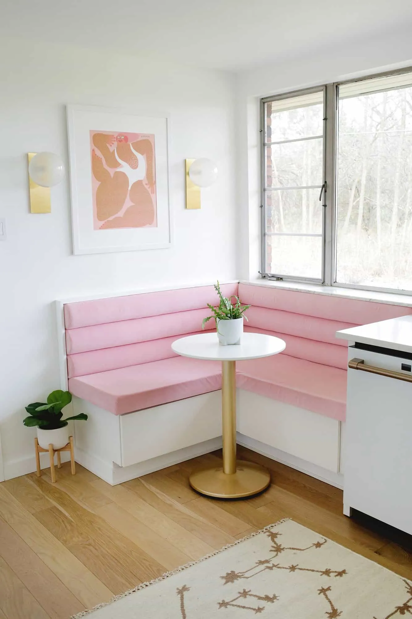 Pink banquette in kitchen corner