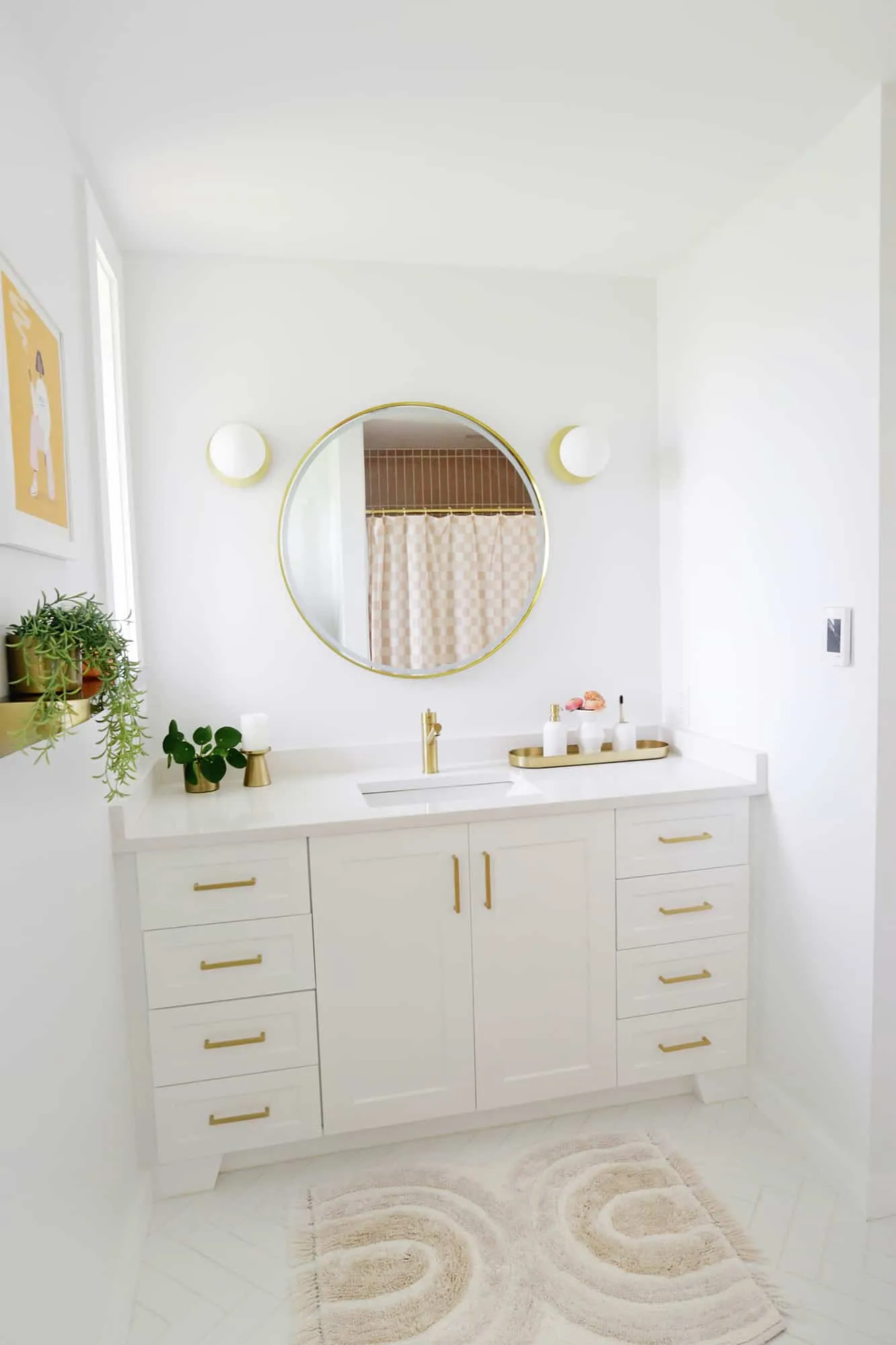 Bright Bathroom with Gold Fixtures